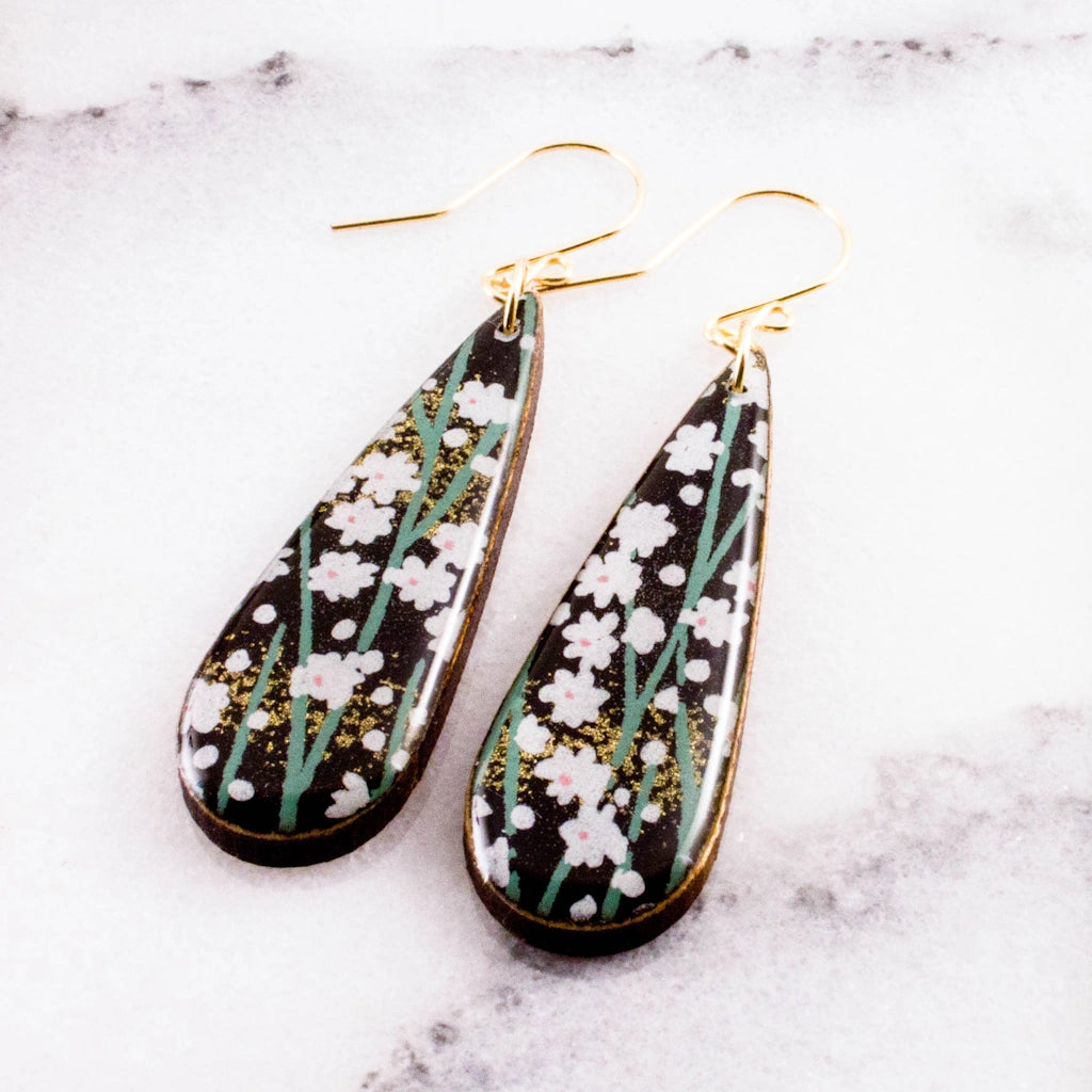 These Black Daisy Teardrop Earrings are available from Campanula Design Studio in Magnolia, Seattle.