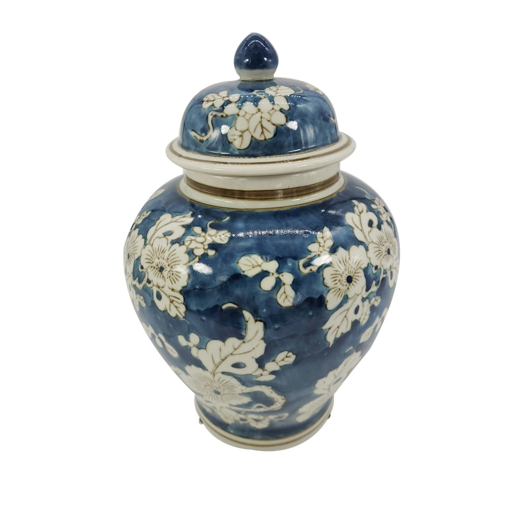 Blue and white blossoming and trailing tree branches chinoiserie print vase is so unique in its gourd design that it stands out no matter what its use or what room it is being used in. Featuring a floral design with blue and white, its sure to bring in the classic French and Asian designs back into style. 