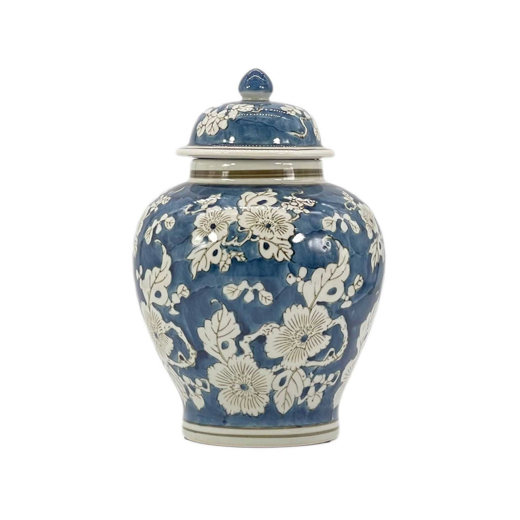 Blue and white blossoming and trailing tree branches chinoiserie print vase is so unique in its gourd design that it stands out no matter what its use or what room it is being used in. Featuring a floral design with blue and white, its sure to bring in the classic French and Asian designs back into style. 