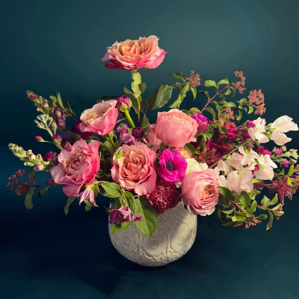 Campanula Design Studio's "Cabernet" flower arrangement features deep wine tones combined with lighter berry tones and pale pinks designed in a ceramic vase. Perfect for Valentine's Day or any day!