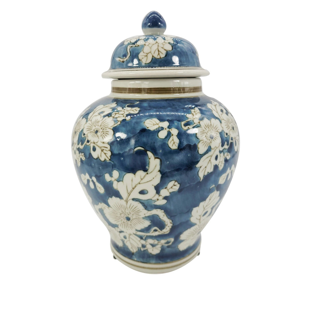 Designed in a 12" blue and white ginger jar, this stunning designer's choice floral arrangement plays nicely off of the lovely print of the jar.