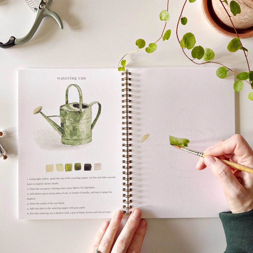 Watercolor workbooks are just like a coloring book, but with watercolor! This garden themed watercolor book is perfect for artists of any age. This book makes a perfect gift for your crafty friend. Available from Campanula Design Studio for nationwide shipping, or combine it with a flower arrangement, gift basket, or houseplant for the perfect gift delivery in the greater Seattle area.