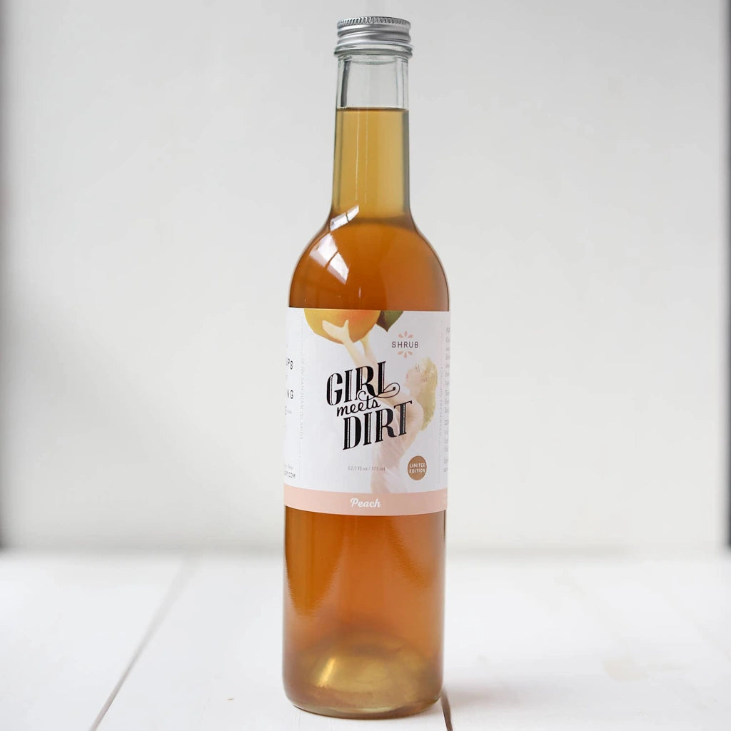 Girl Meets Dirt Peach Shrub is a perfect mixer for your cocktail or mocktail. Available from Campanula Design Studio, Seattle's gift basket and flower shop.