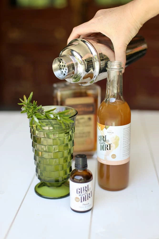 Girl Meets Dirt Peach Shrub is a perfect mixer for your cocktail or mocktail. Available from Campanula Design Studio, Seattle's gift basket and flower shop.