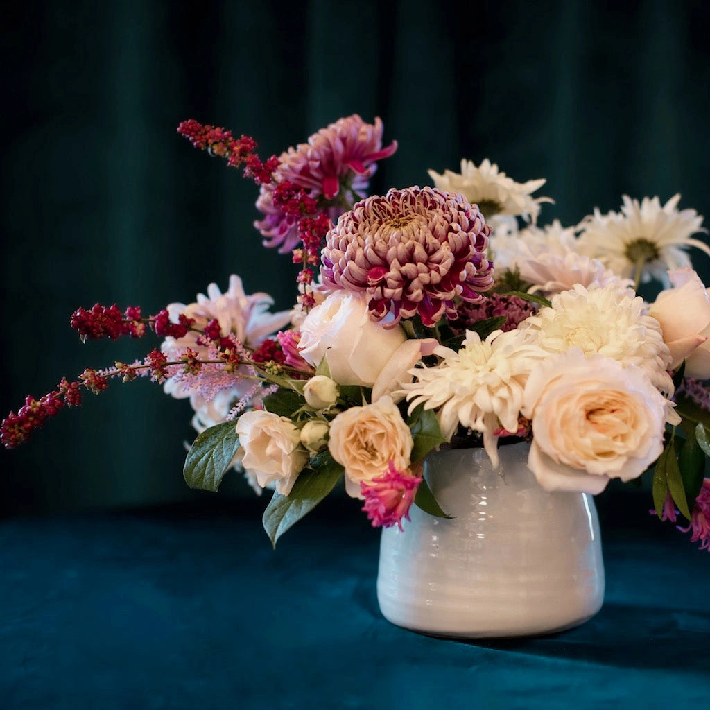 Designer's Choice Holiday floral arrangement. Order seasonally inspired and premium flowers from Magnolia florist Campanula Design Studio.