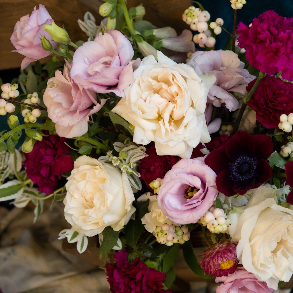 Designer's Choice Holiday floral arrangement. Order seasonally inspired and premium flowers from Magnolia florist Campanula Design Studio.