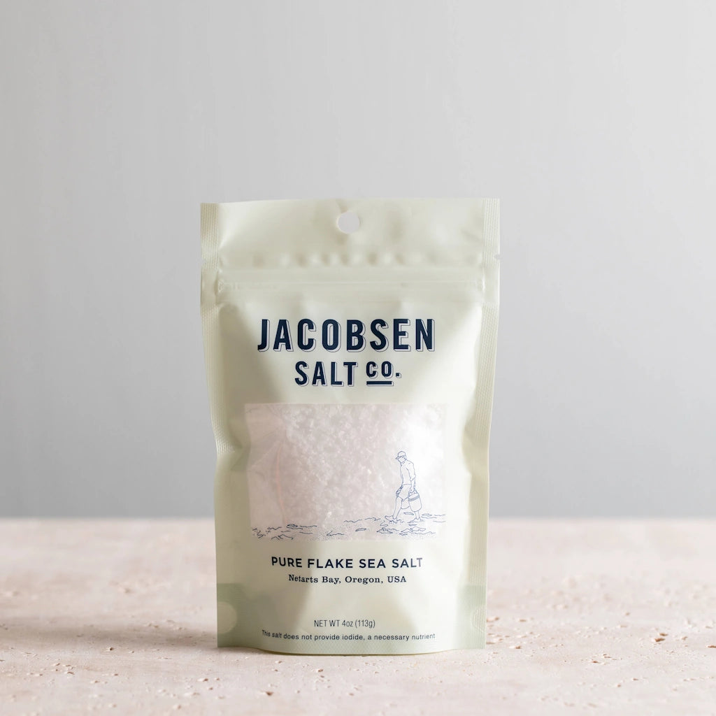 Jacobsen Salt Co pure flake sea salt. This signature flake finishing salt is the product that put Jacobsen Salt Co. on the map. Hand-harvested from the cold and pristine waters of Netarts bay on the Oregon Coast, our flaky finishing salt has bright salinity and a delicate crunch.