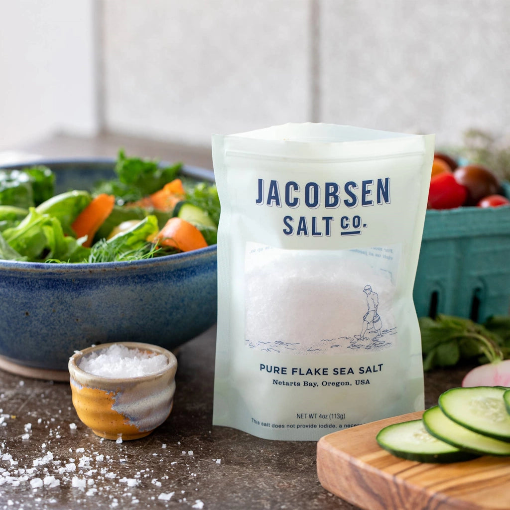 Jacobsen Salt Co pure flake sea salt. This signature flake finishing salt is the product that put Jacobsen Salt Co. on the map. Hand-harvested from the cold and pristine waters of Netarts bay on the Oregon Coast, our flaky finishing salt has bright salinity and a delicate crunch.