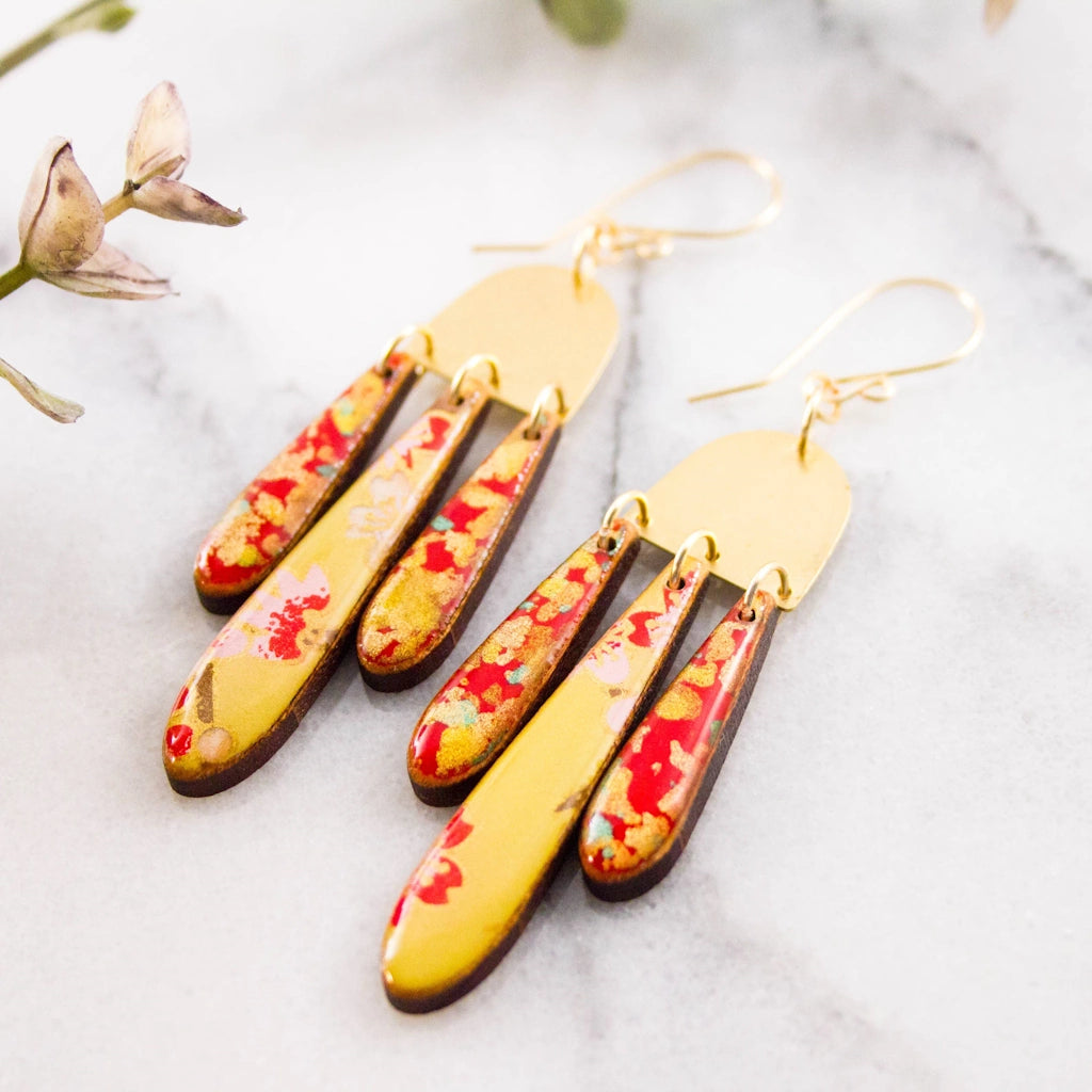 These Japanese Triple Raindrop Earrings in Red and Gold are available from Campanula Design Studio, Seattle's premier gift shop and florist in Magnolia.