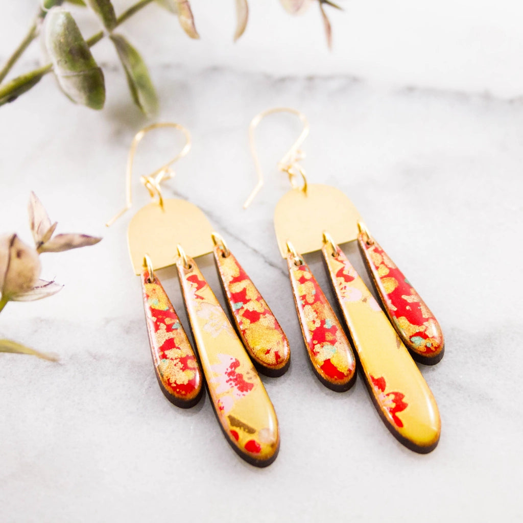 These Japanese Triple Raindrop Earrings in Red and Gold are available from Campanula Design Studio, Seattle's premier gift shop and florist in Magnolia.