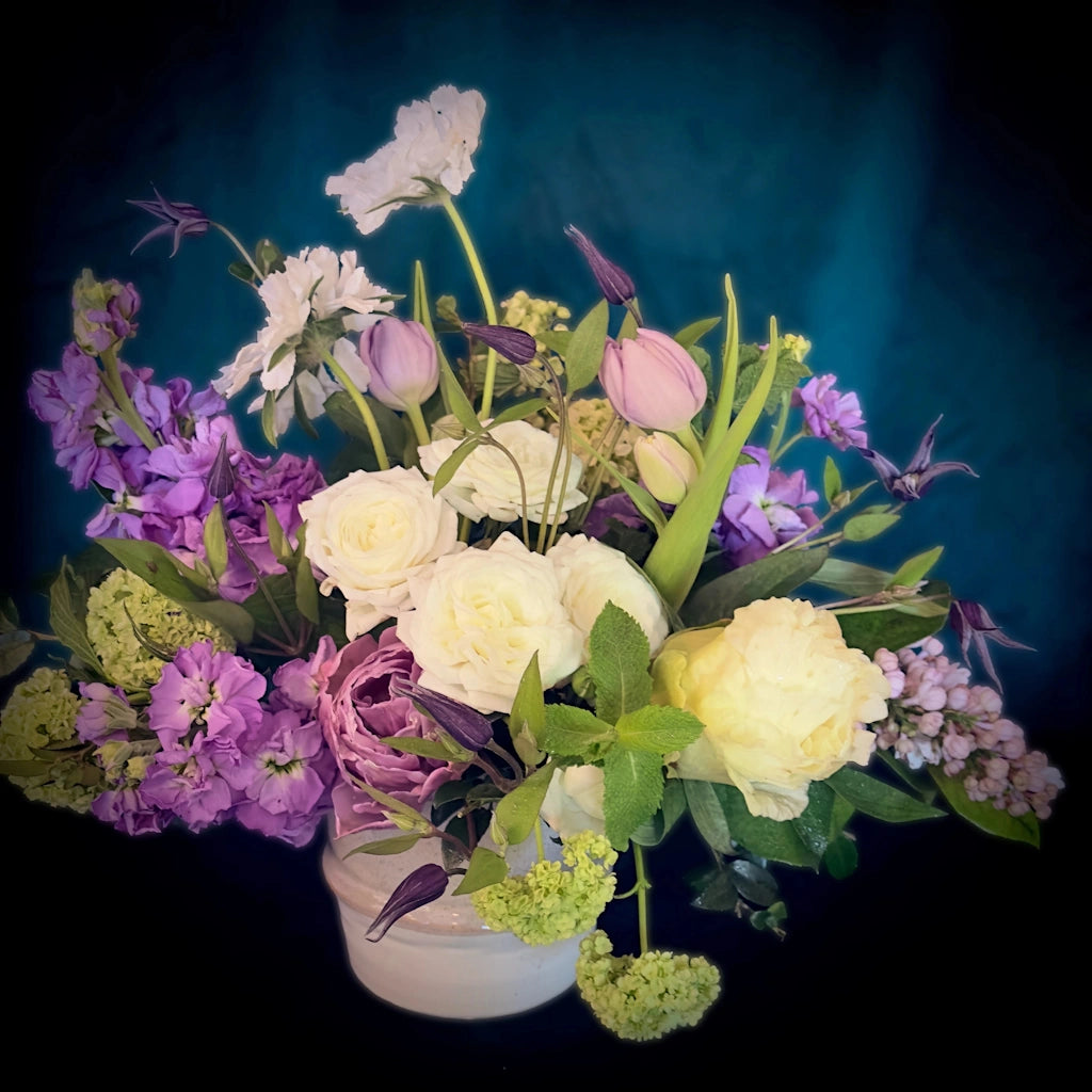 This beautiful flower arrangement in tones of purple and cream is available from Campanula Design Studio in Seattle for Mother's Day or any day!