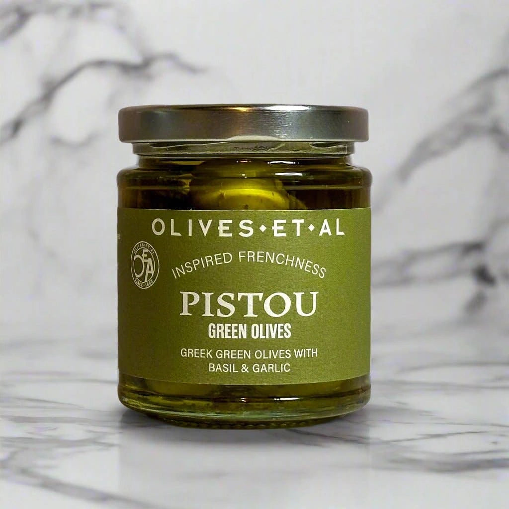 These pistou Greek green olives with basil and garlic make a delicious addition to your relish tray or charcuterie board. Available on their own or as part of a gift basket from Seattle florist, Campanula Design Studio.