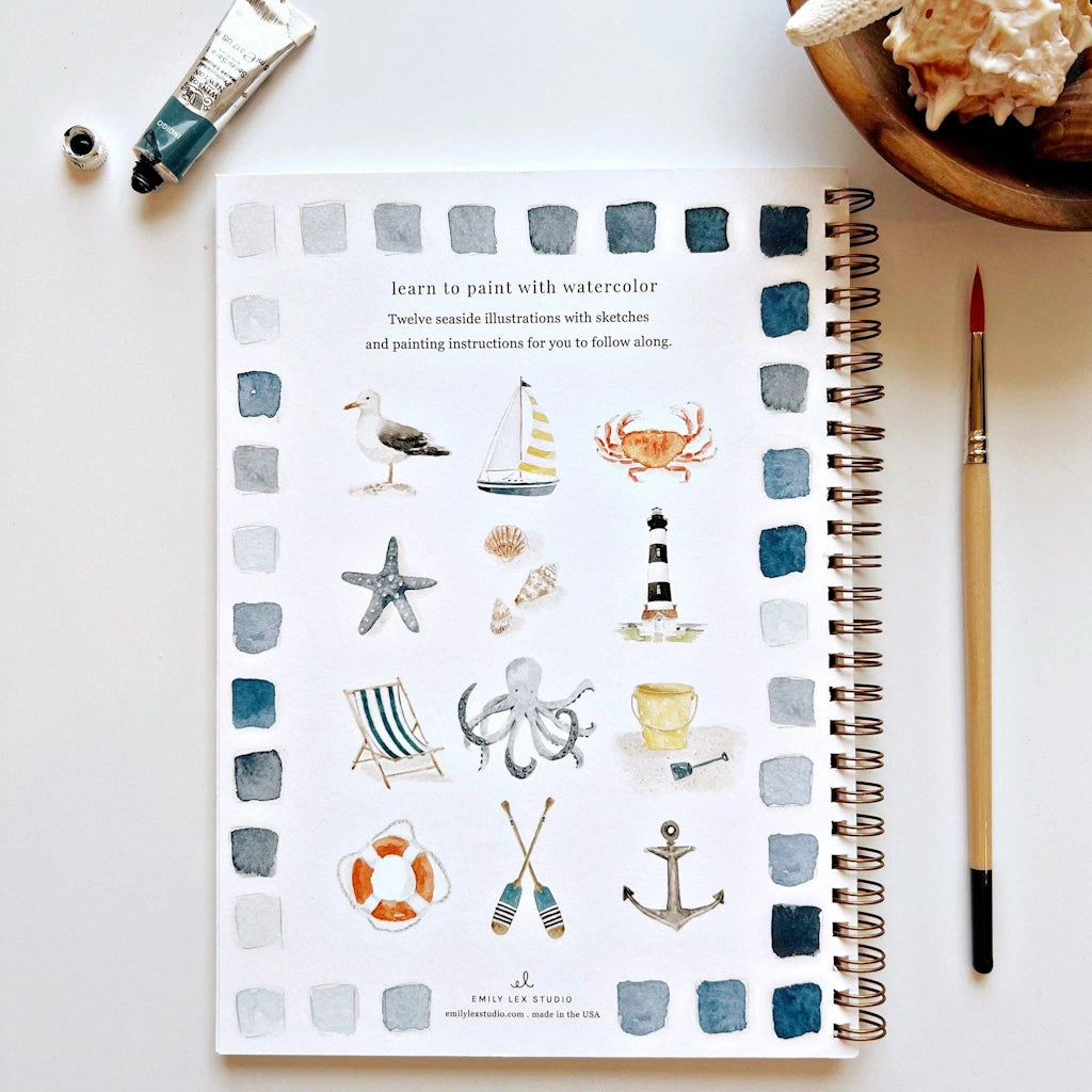 The Seaside Watercolor Workbook includes 12 coastal-themed illustrations with an example of the finished painting, step-by-step instructions, and a lightly illustrated sketch for you to paint. Available from Seattle gift shop, Campanula Design Studio in Magnolia. Purchase on its own for nationwide shipping, or combine with a gift basket, floral arrangment, or houseplant for the perfect gift.