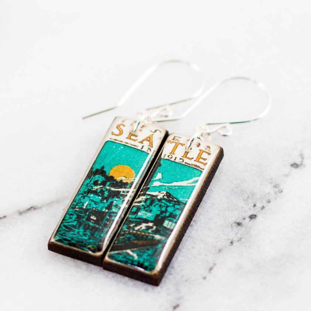 Seattle in 1915 Vintage Poster Stamp Earrings available from Magnolia Gift shop and Seattle florist, Campanula Design Studio.