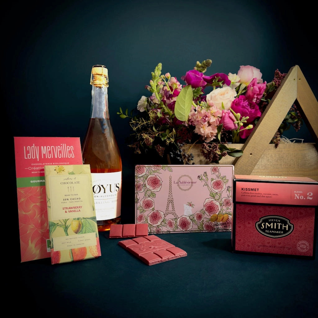 Campanula Design Studio's "Strawberry Fields Forever" gift basket is the ultimate Valentine's day gift. Beautiful pink-themed basket with chocolate, rose (alcoholic or non-alcoholic), tea, and shortbread cookies. Delivery in the greater Seattle area or pick up from our gift basket and florist shop in Seattle in the Magnolia neighborhood.