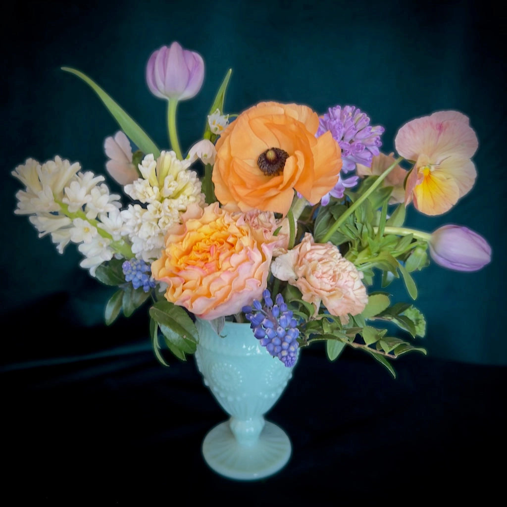 Simple, sweet and beautiful, this petite flower arrangement will melt your Mother's heart this Mother's Day. Available from Campanula Design Studio of Seattle.