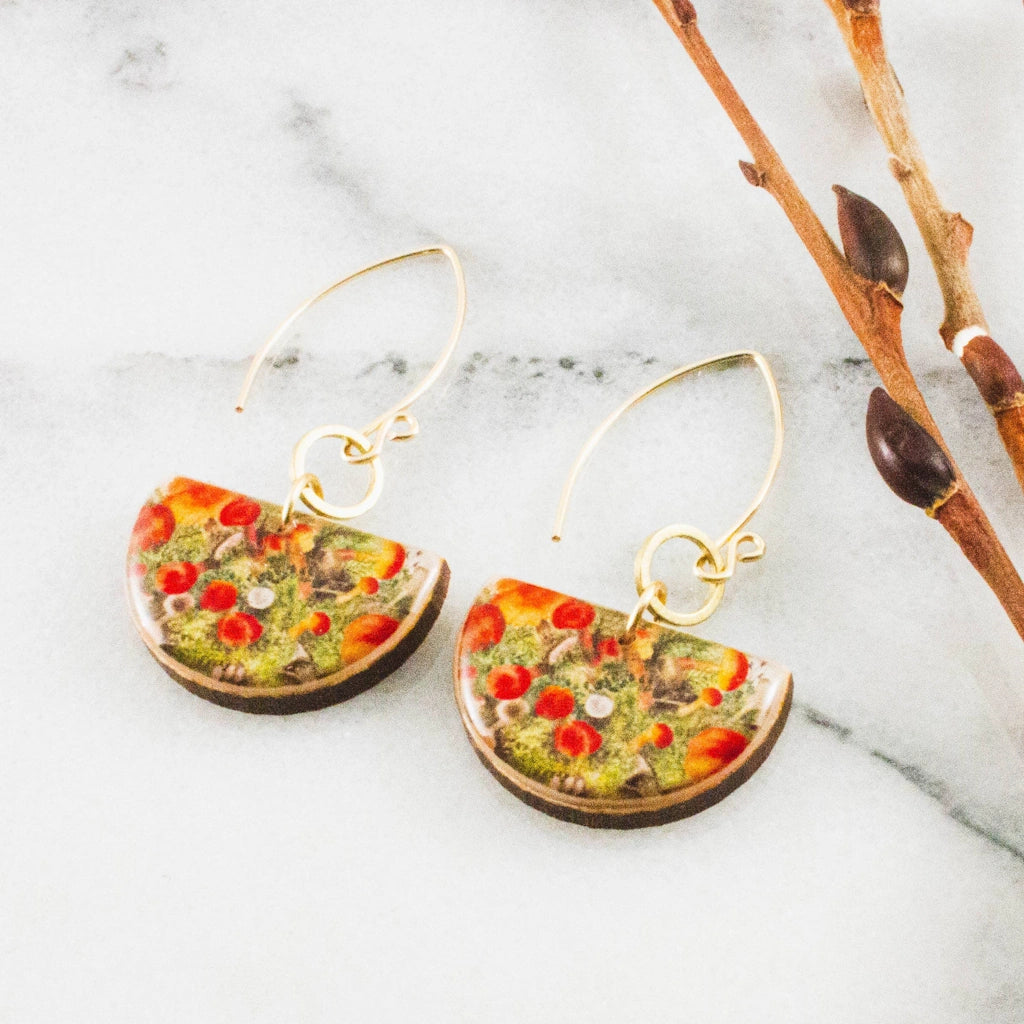 Give these vintage mushroom patch earrings to your mushroom loving friend, or buy them for yourself for a special treat. Available from Campanula Design Studio in Seattle.