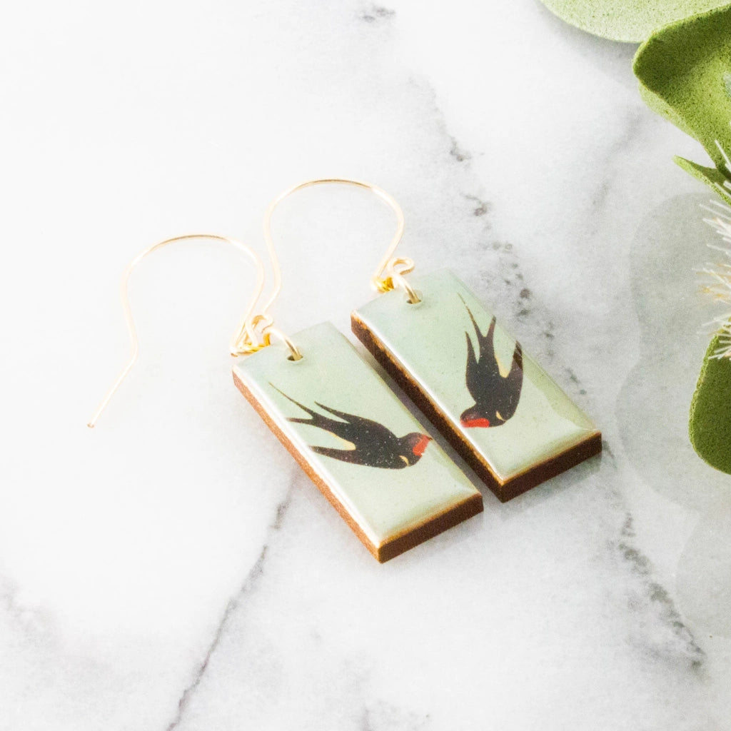 These vintage swallow bird earrings are available from Campanula Design Studio in the Magnolia Neighborhood of Seattle. Have them shipped nationwide, or delivered in Seattle.