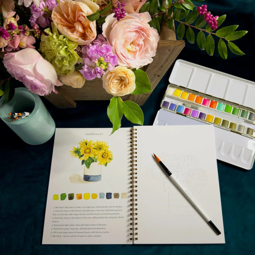 Watercolor book, paints and container gift box for your creative friend. Available from our Seattle Flower shop in Magnolia, nationwide shipping or gift delivery in the greater Seattle area.